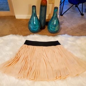 Pleated skirt with vegan leather waste band